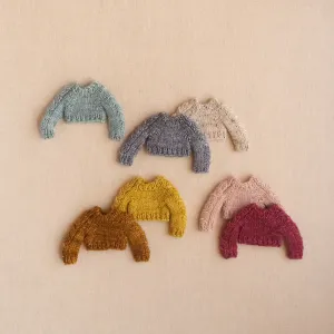 hand-knit cable sleeve sweater